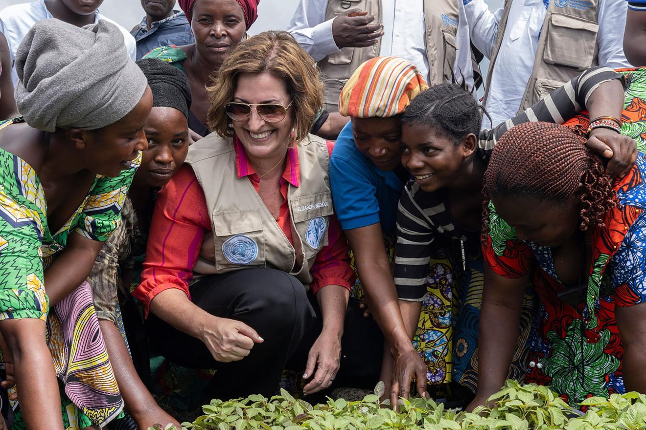 A group of women working in a micro-garden in a camp for internally displaced people in the Democratic Republic of Congo.  