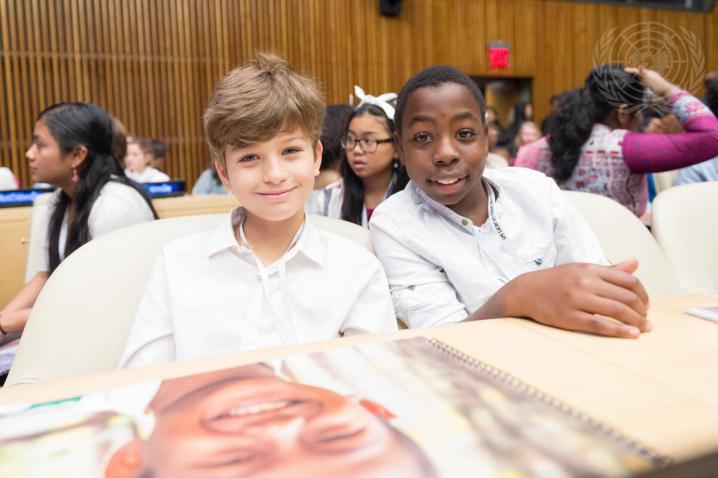 Children pose for a photo during a special event held to mark the United Nations Universal Children’s Day.