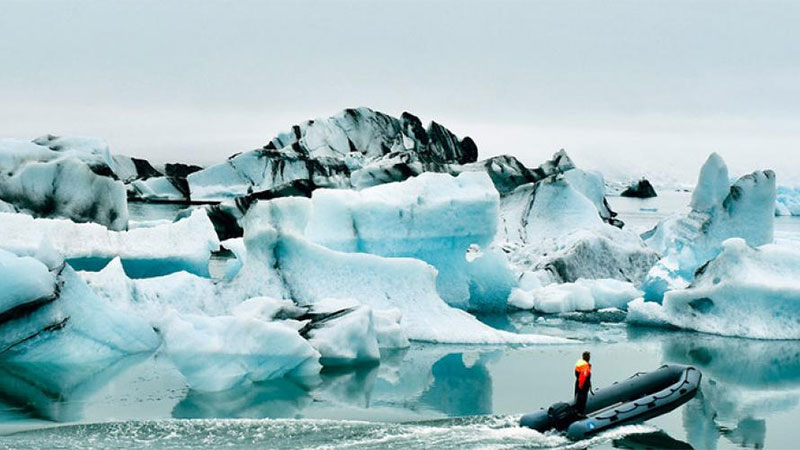 The Jökulsárlón Glacier Lagoon in Iceland is formed naturally from melted glacial water and is perpetually growing while big blocks of ice crumble from a shrinking glacier.