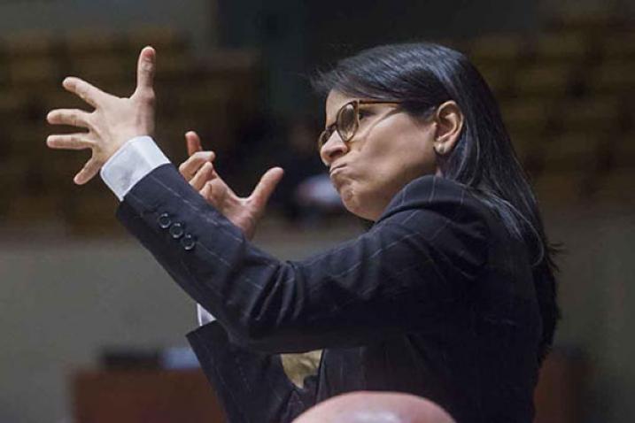 A woman using sign language 