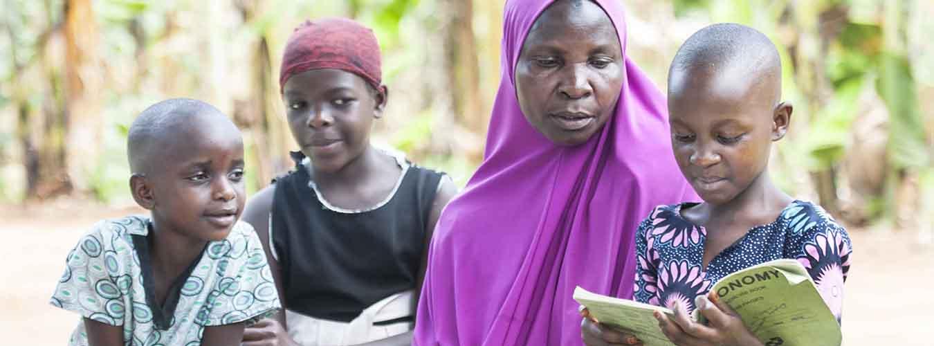 A woman reading with children